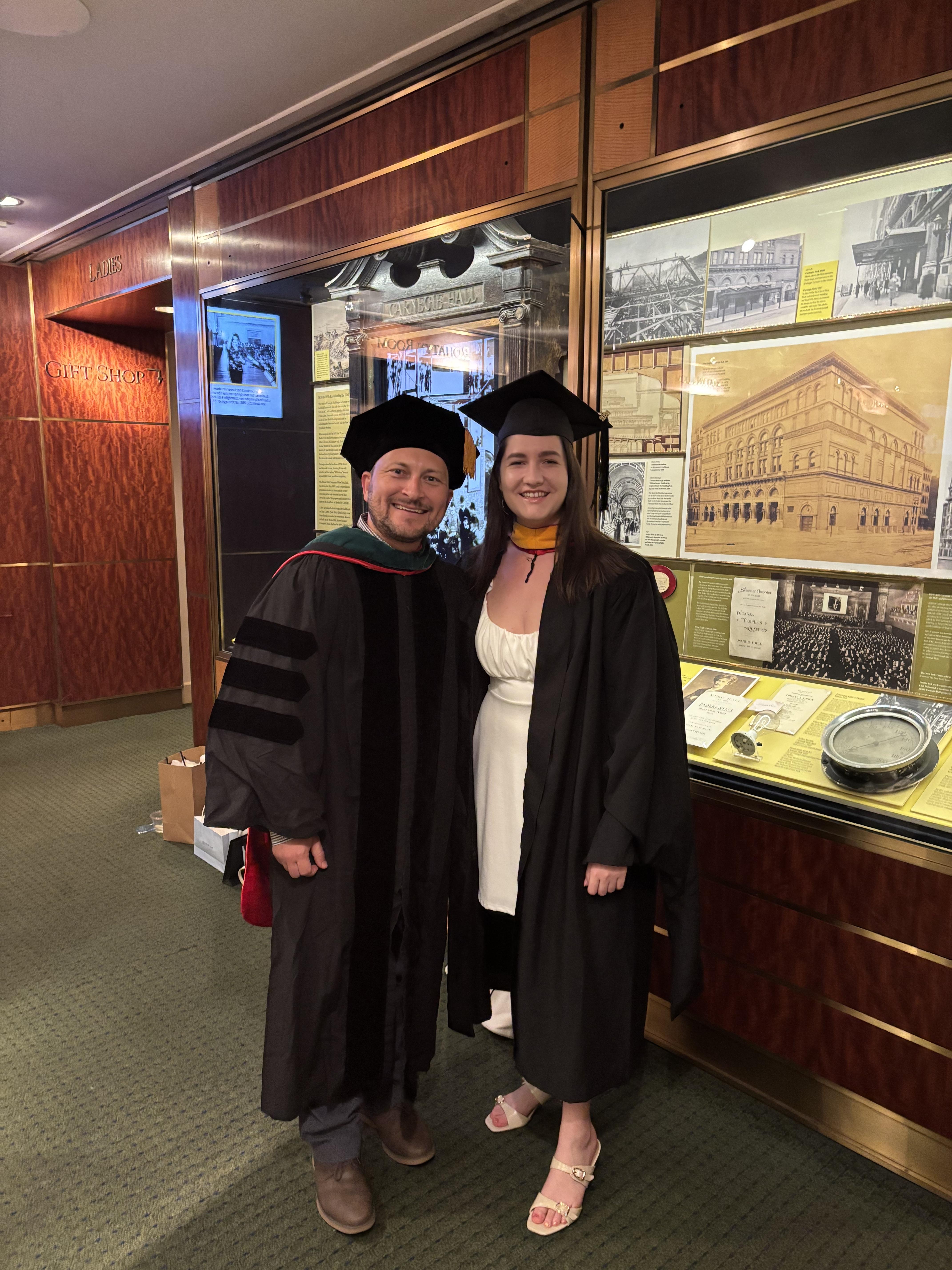 Nicholas Brady and Lucia Kisova in their graduation regalia